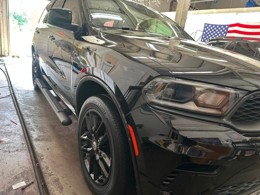 Black Dodge Durango after detailing in Tony's shop
