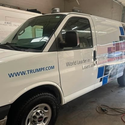 Side of a local corporate fleet GMC van after detailing by Tony