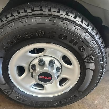 Cleaned GMC wheel and dressed tire on a fleet van Tony detailed