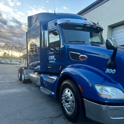 Blue Peterbilt semi tractor after detailing by Tony