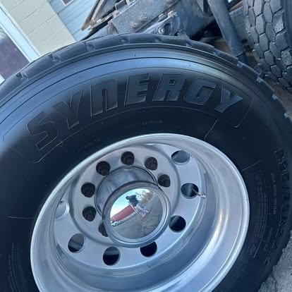 Polished semi wheel and dressed tire after detailing by Tony